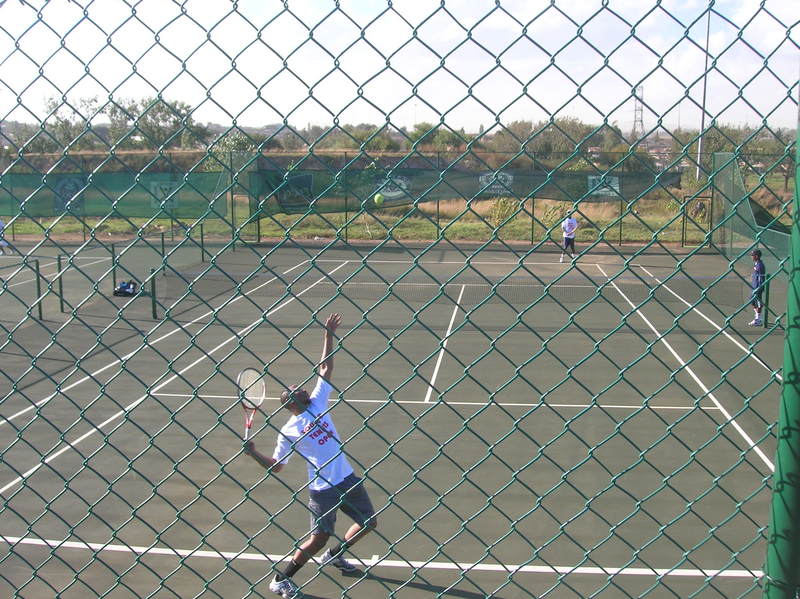 A ball, a racquet and a court.