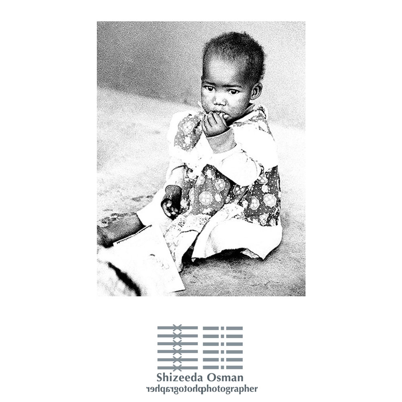 Child in the market in Maseru