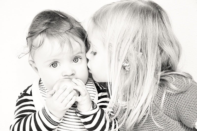 Sister loves baby brother (say aww)