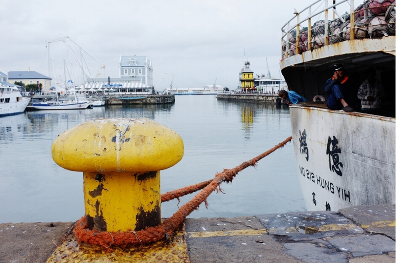 Chinese Sailor sitting on the ledge