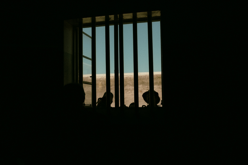 Photographers peering into Madiba's cell