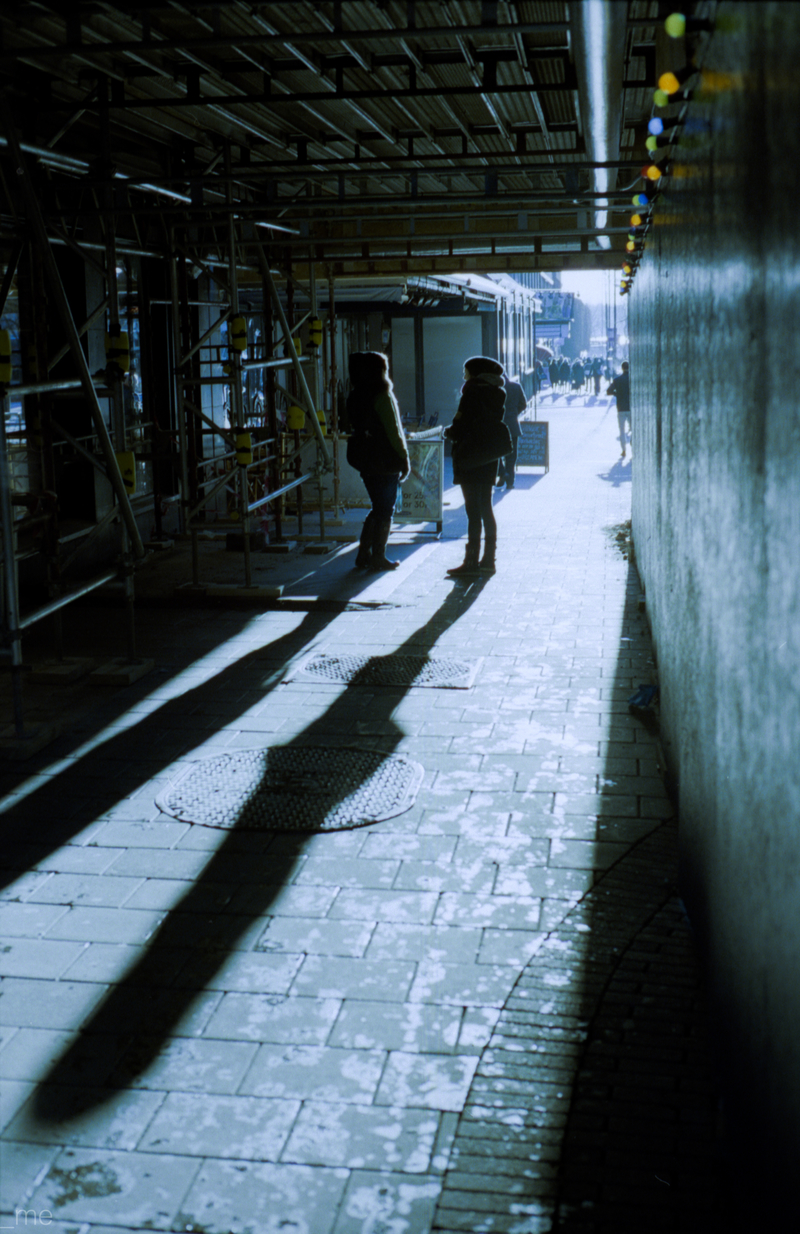 Two ladies having a chat in a nice beam of light
