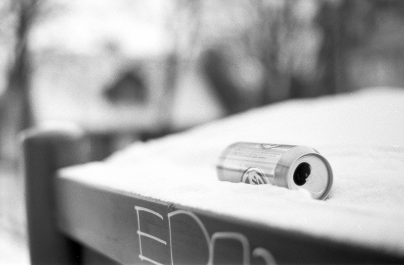 A can of beer in the snow