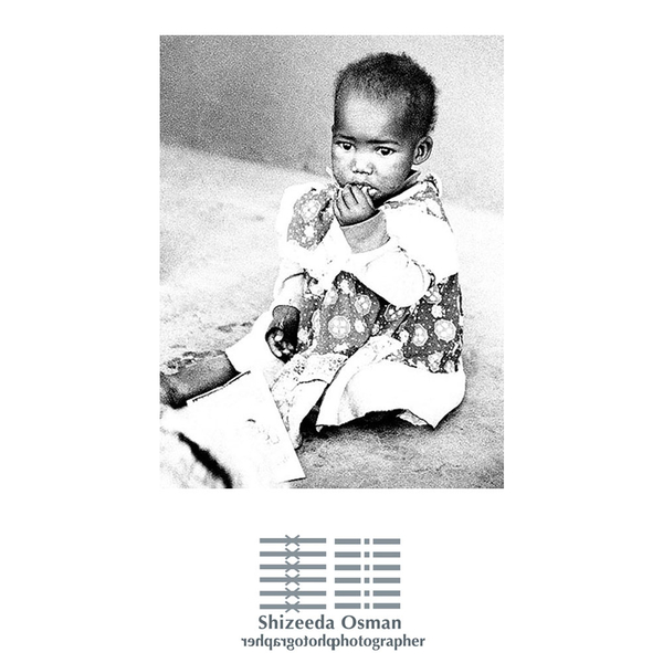 Child in the market in Maseru